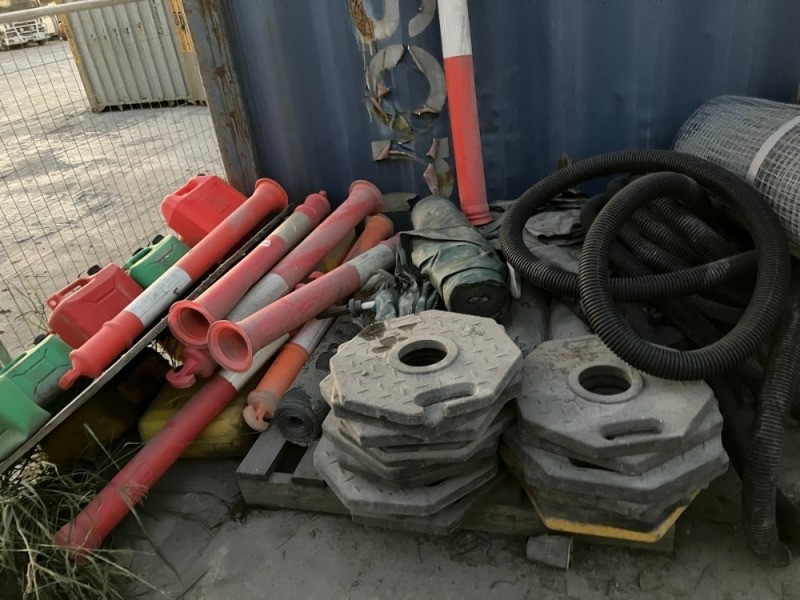Pallet Of Safety Cone Bases, Safety Bollards, Mesh Tarp Rolls, Wire Mesh Rolls, Coil of Heavy-Duty Black Corrugated Pipe and Jerry Cans