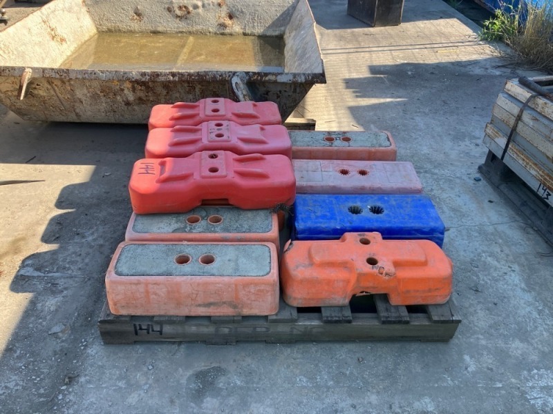 Pallet Of High Visibility Concrete Filled Temporary Fence Feet
