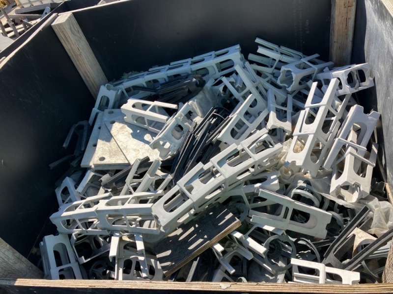 Timber Site Box Containing Steel Scaffolding components, Plastic Top Deck Chairs and Various Size Concrete Spacers.